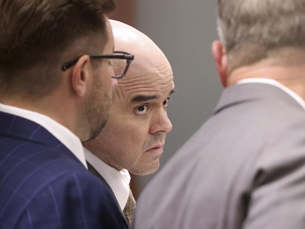 Robert Telles, center, listens in court with his attorneys Robert Draskovich, right, and Michael Horvath, prior to jury selection on the second day of his murder trial at the Regional Justice Center in Las Vegas Tuesday, Aug. 13, 2024. Telles, a former Clark County public administrator, is charged in the murder of Las Vegas Review-Journal investigative journalist Jeff German. 