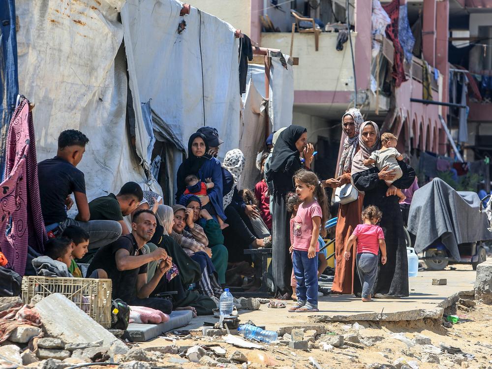 Thousands of displaced Palestinians on their way to find somewhere to stay after Israeli authorities order them to evacuate an area once declared a safe humanitarian zone due, in the eastern part of Khan Younis, Gaza, on July 23.