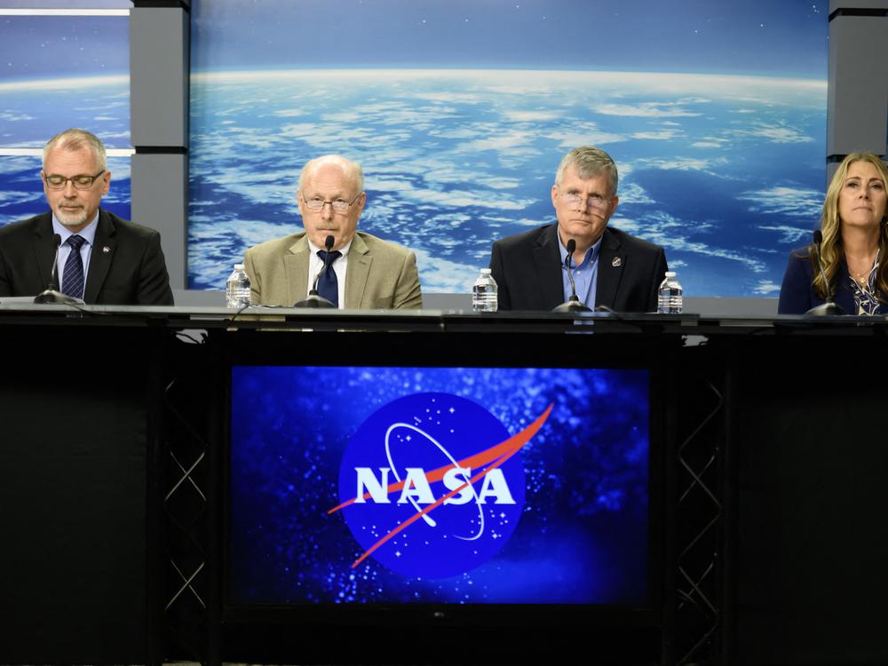 NASA Associate Administrator James Free (L-R), Associate Administrator Ken Bowersox, Commercial Crew Manager Steve Stich and International Space Station Program Manager Dana Weigel speak during a news conference to discuss plans to return two astronauts who remain stranded at the International Space Station, at Johnson Space Center in Houston, Texas, last Saturday.