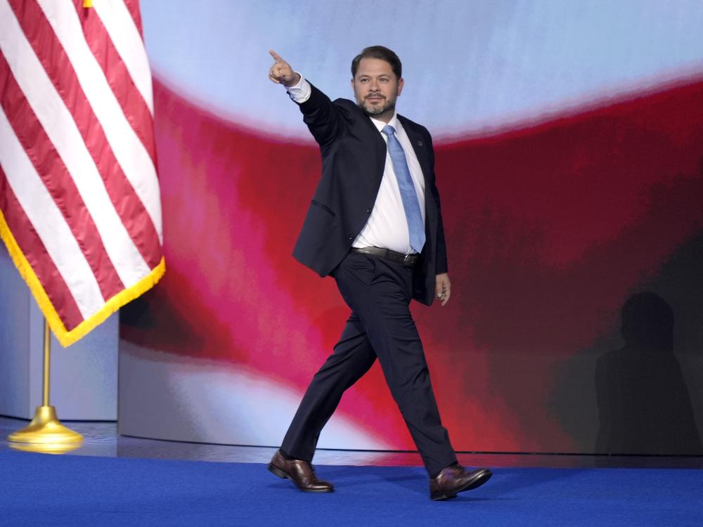 Rep. Ruben Gallego, D-Ariz., walks on stage to speak during the Democratic National Convention Thursday, Aug. 22, 2024, in Chicago.