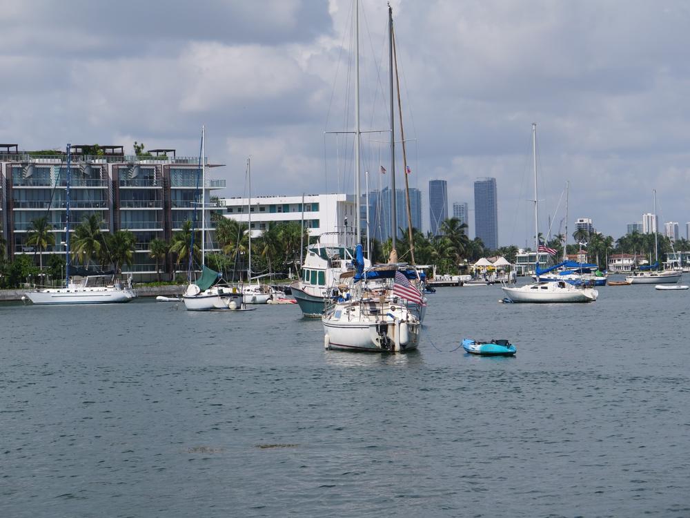 More than 100 people live aboard sailboats and other vessels anchored just off Miami Beach. For years, some in the posh seaside community have not been happy about people just offshore.