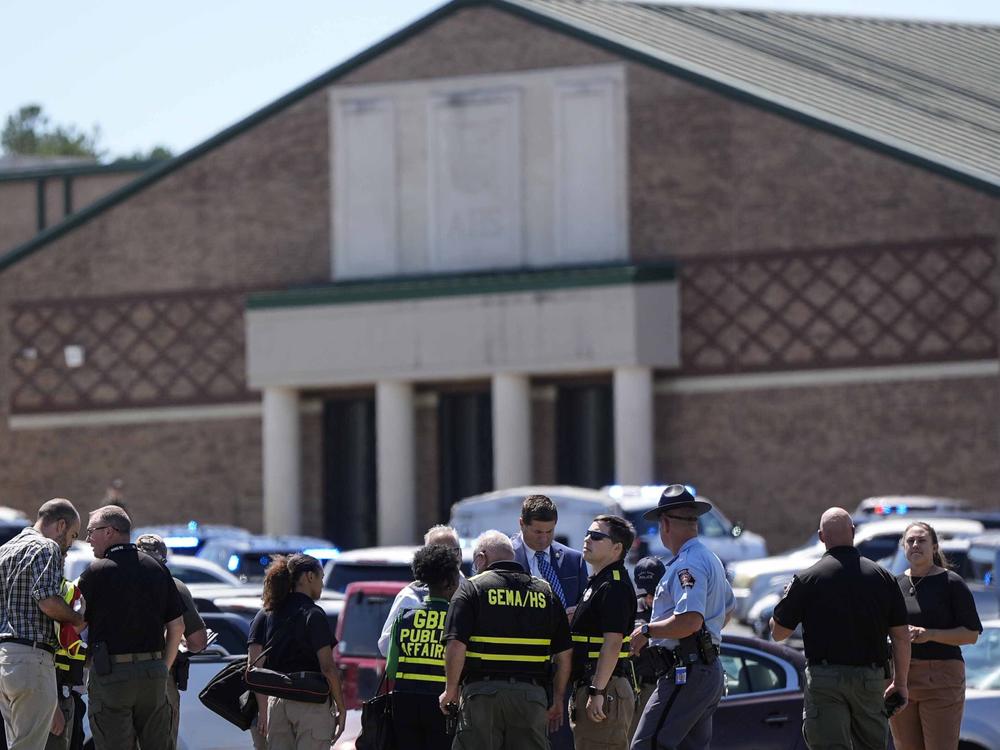 Law enforcement officers and first responders respond to Apalachee High School in Winder, Ga., on Wednesday, after a shooting was reported.