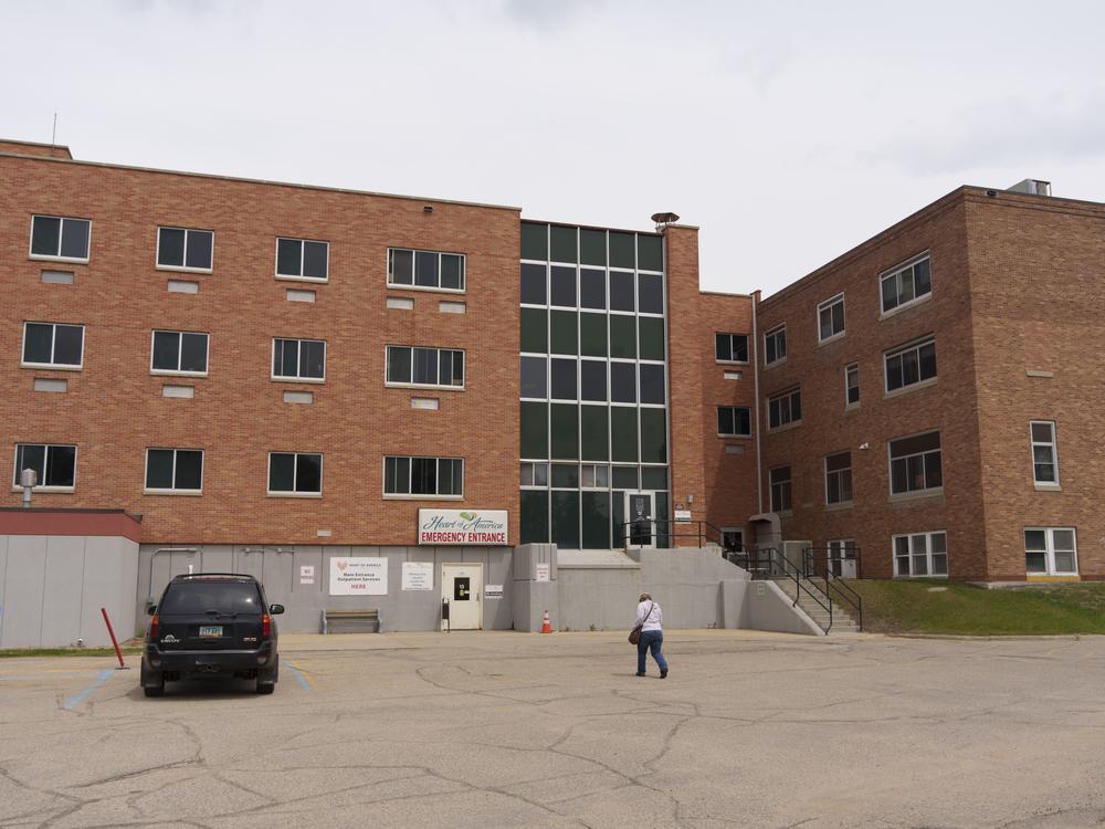 A person makes their way into the Heart of America Medical Center in Rugby, N.D., on May 21. The cost of long-term care can be challenging for some small family farmers to afford, especially if their assets are tied up in their farm and equipment.