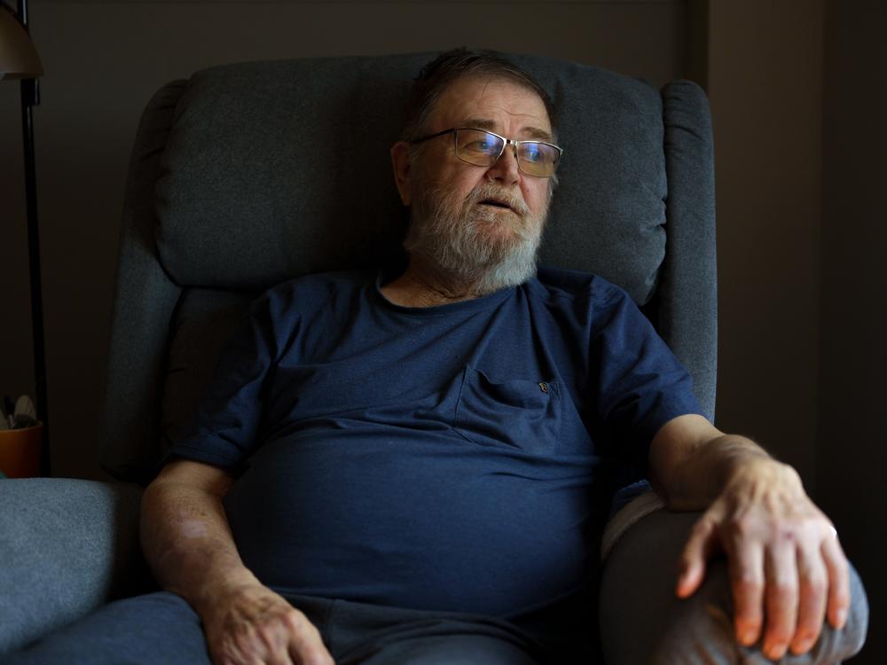 Sherwood Haakenson sits in his room at the Heart of America Medical Center long-term care facility in Rugby, N.D., on May 14. 