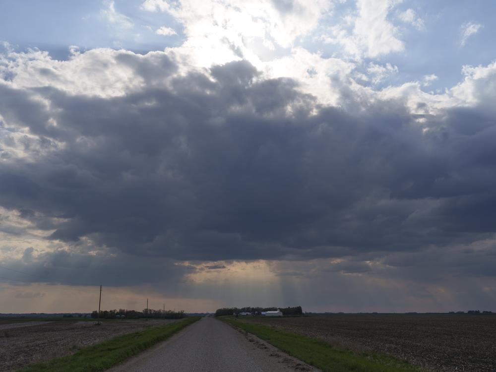 Rain clouds gather near the Haakenson family farm in Willow City, N.D., on May 21. Most of the small cattle and wheat farm has been in Sherwood Haakenson’s family for over 130 years.
