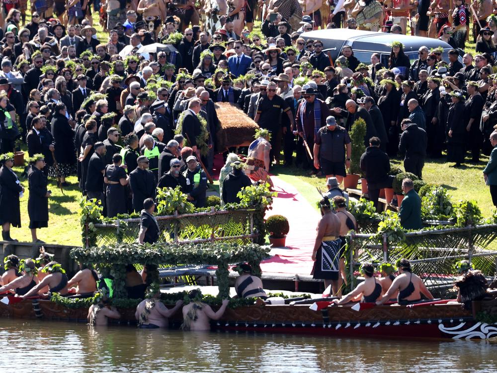 Mourners pay their respects to the late Maori King Tuheitia Pootatau Te Wherowhero VII as his coffin is carried toward the Waikato River en route to his final resting place in Hamilton, New Zealand, on Thursday. 
