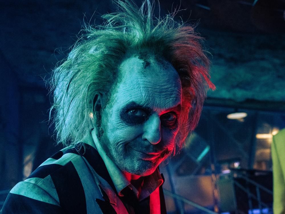 Turns out Beetlejuice (Michael Keaton) hasn't changed much in 30-odd years — he's less of a villain, but still a pain in the neck.