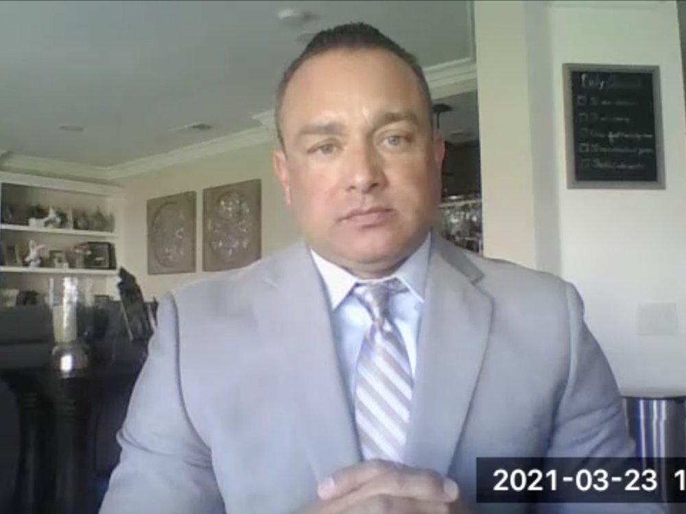 A screenshot of LAPD officer Matthew Garza testifying against Rick Jacobs.