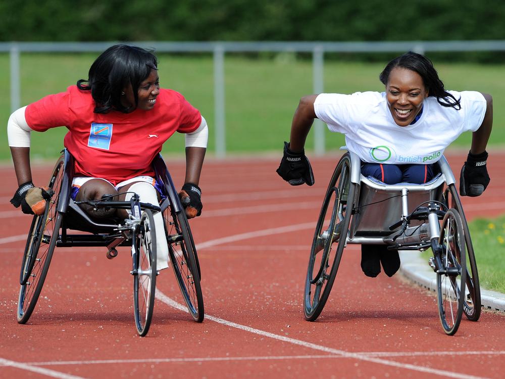 Dedeline Mibamba Kimbatahas (left) a Paralympian from the Democratic Republic of Congo, is coached by former Paralympians and wheelchair racer Anne Wafula Strike, who contracted polio as a child in Kenya.
