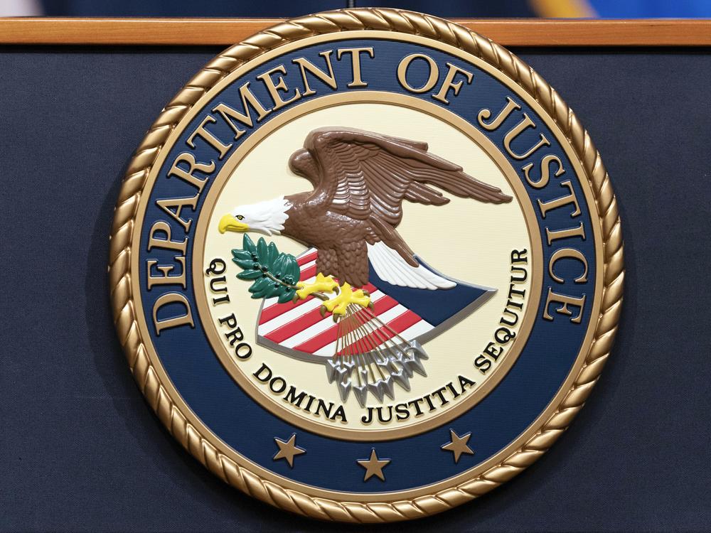 FILE - The Department of Justice seals is seen during a news conference at the DOJ office in Washington, May 16, 2023. (AP Photo/Jose Luis Magana, File)