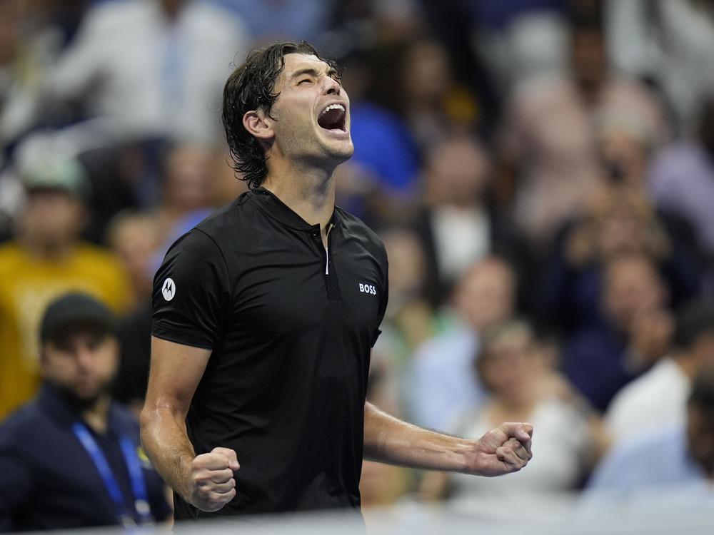 Taylor Fritz of the U.S reacts after defeating Frances Tiafoe during the men's singles semifinals of the U.S. Open tennis championships on Friday in New York. 