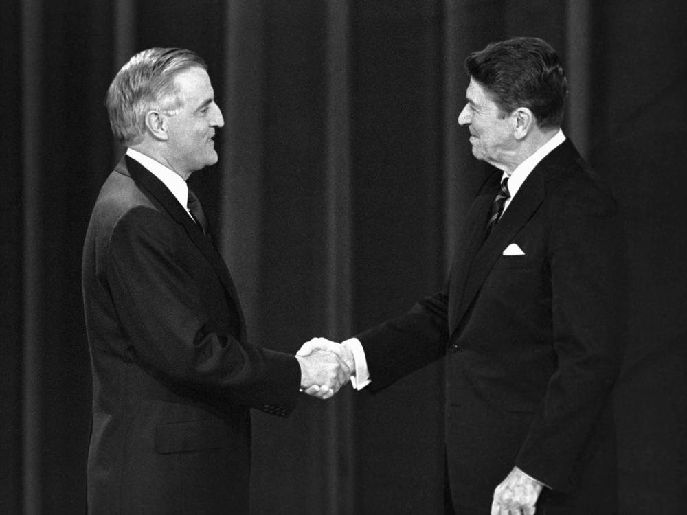 President Reagan and Democratic candidate for President, Walter Mondale, shake hands as they greet one another before the start of their debate in Louisville, Ky., on Oct. 7, 1984. 