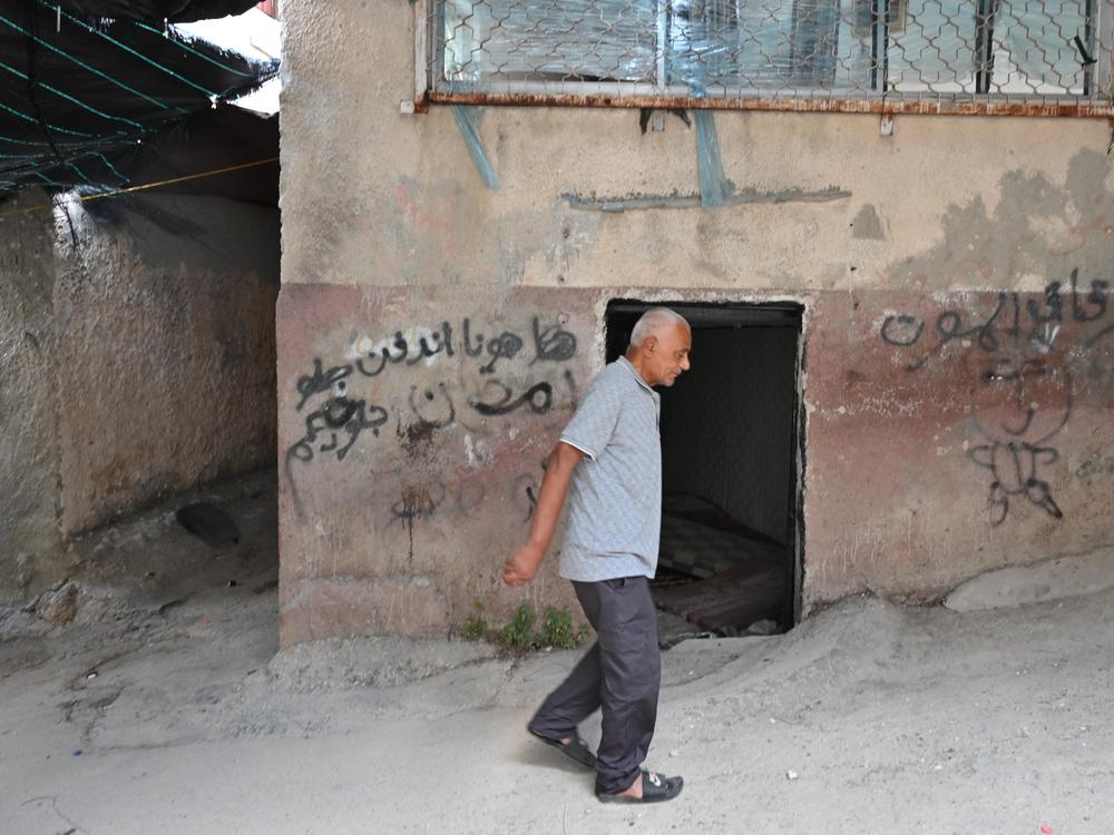 The al-Damaj neighborhood of the camp, which recently saw many drone attacks that killed Palestinians. There is graffiti just outside that says “The Alley of Death.” Here is a portion of a house that was damaged by a drone strike.