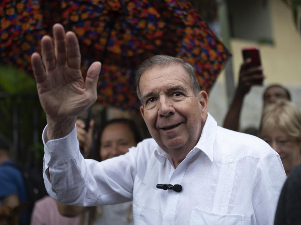 Venezuelan opposition presidential candidate Edmundo González waves to supporters during a political event at a square in the Hatillo municipality of Caracas, Venezuela, June 19, 2024.