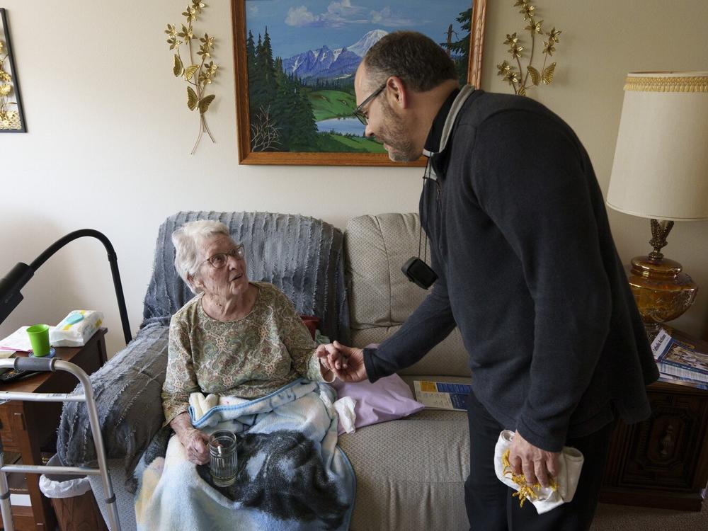 Benz bids farewell to Viola Weinhardt, 94, at her home in Glen Ullin on May 24.