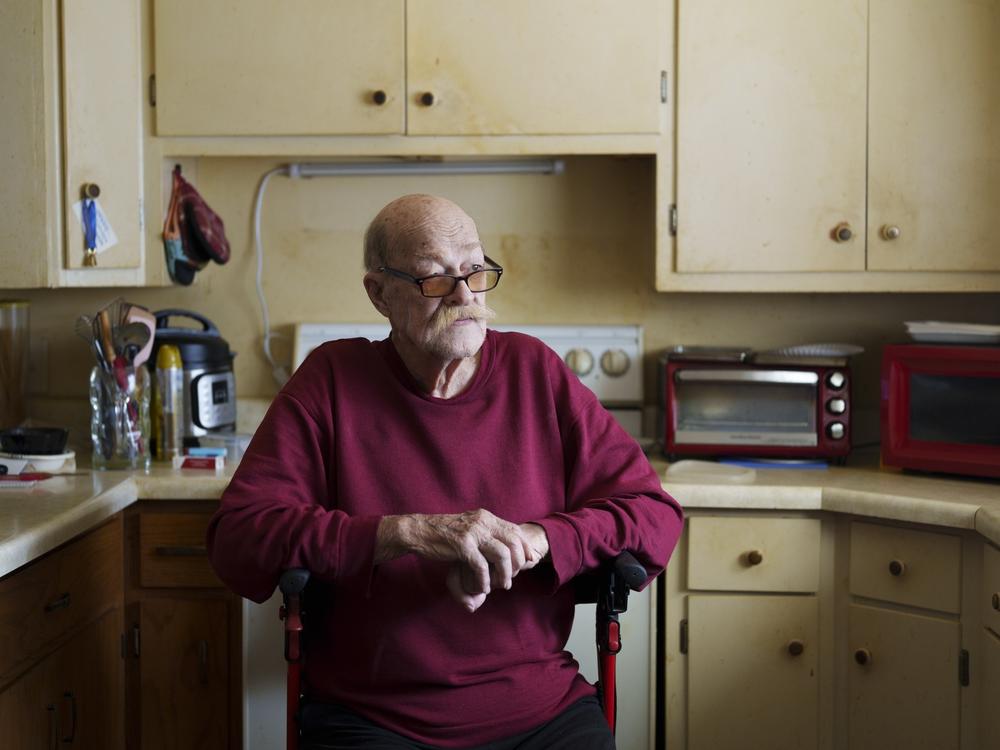 Don Fitterer, 81, sits for a portrait at his home in Glen Ullin, N.D., on May 23. Fitterer is a participant in the Western Morton County Aging in Community program, which connects older adults in the medically underserved area of western Morton County with a variety of resources that can improve their quality of life. 