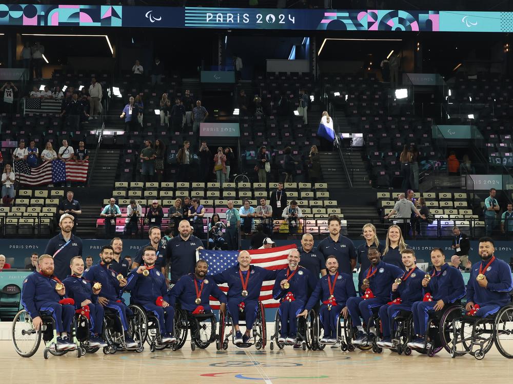 U.S. players pose with their gold medals after winning the wheelchair basketball men's gold medal match at the 2024 Paralympics on Saturday.