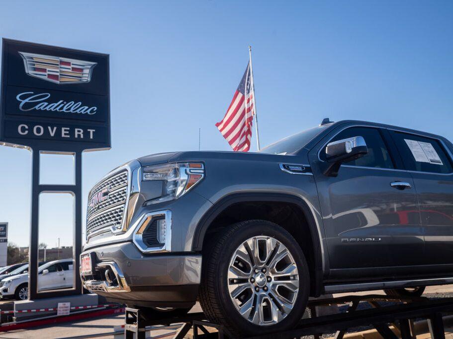 A GMC pickup truck for sale on a lot at a General Motors dealership in January 2023 in Austin, Texas. Federal regulators are proposing new regulations for vehicle design in order to protect pedestrians.  