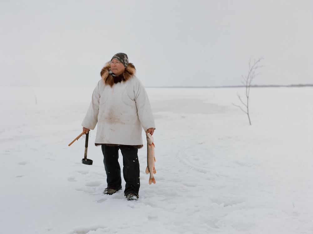 Dominic Hunt holds a catch from a blackfish trap on the Yukon River near Emmonak, Alaska. Dominic and his wife Lala are community volunteers with Qungasvik who help organize traditional subsistence activities like ice fishing and tool crafting. “Growing up, I rarely heard about suicide”, says Hunt, reflecting a view that’s echoed by many Elders who were alive prior to the era of residential boarding schools. It wasn’t until his own brother died by suicide that Hunt was first confronted by the issue head-on…