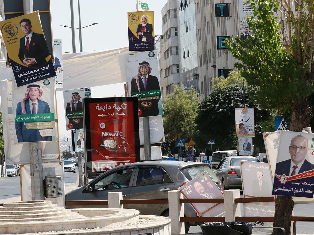Electoral posters are displayed in a street in Amman in early September, ahead of the parliamentary election.