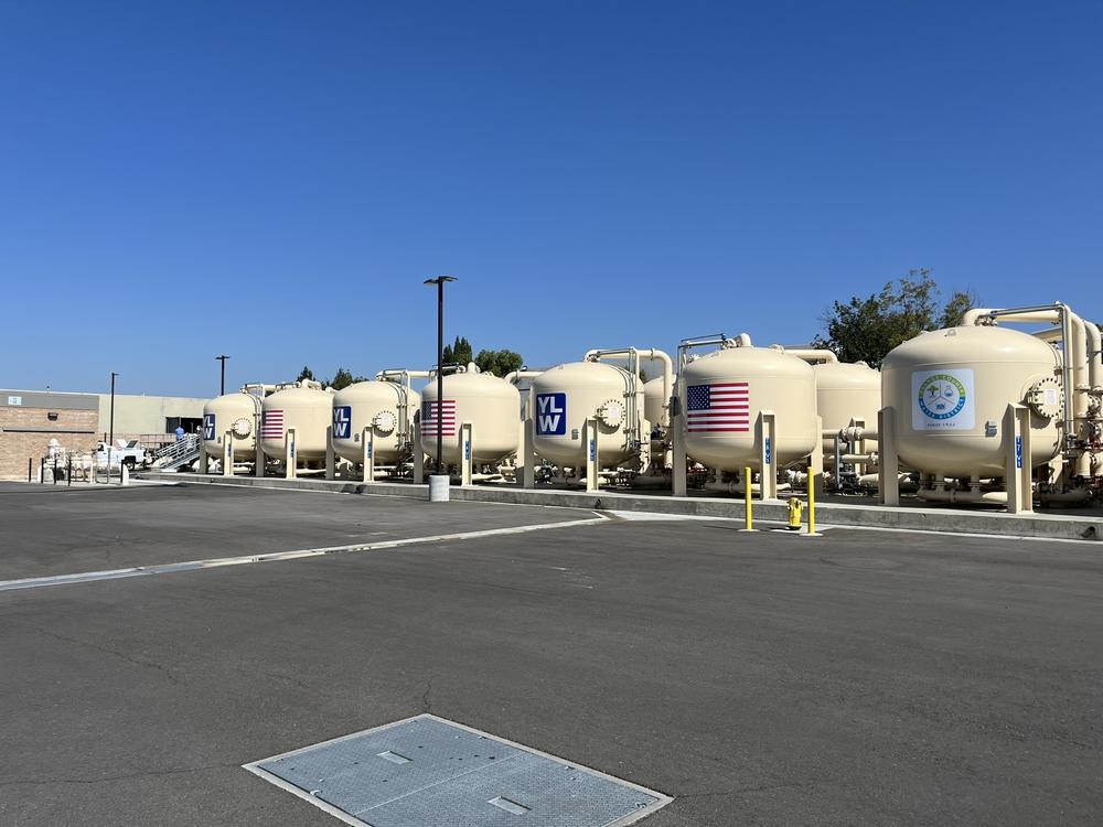 Tanks to remove PFAS from drinking water at the Yorba Linda Water District's treatment plant have taken over a strip of the parking lot. 