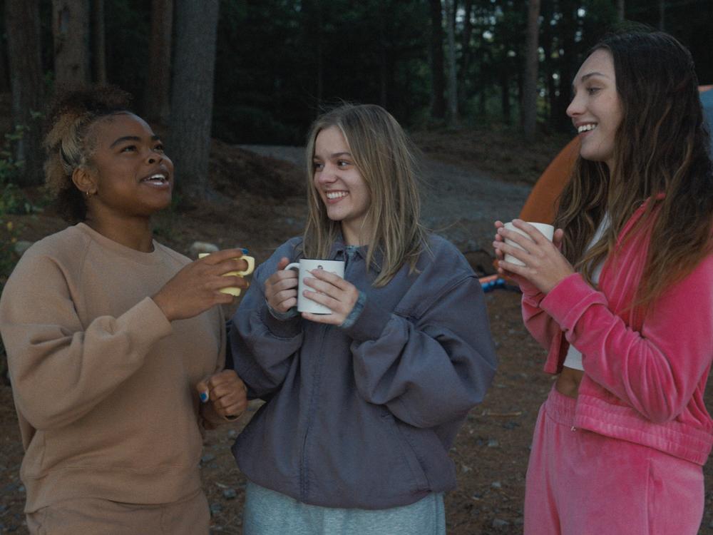 Kerrice Brooks as Ro, Maisy Stella as Elliott, and Maddie Ziegler as Ruthie in <em>My Old Ass.</em>