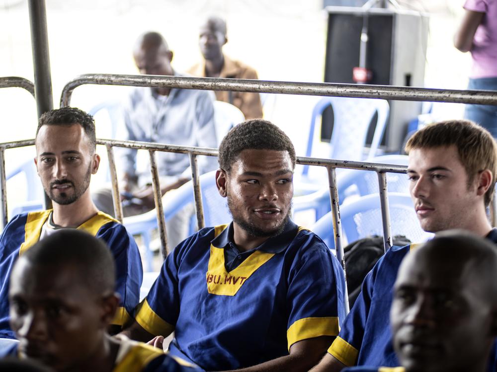 Benjamin Reuben Zalman-Polun, left, Marcel Malanga and Tyler Thompson, all American citizens, attend a court verdict in DRC, Kinshasa, on charges of taking part in a coup attempt in May 2024.