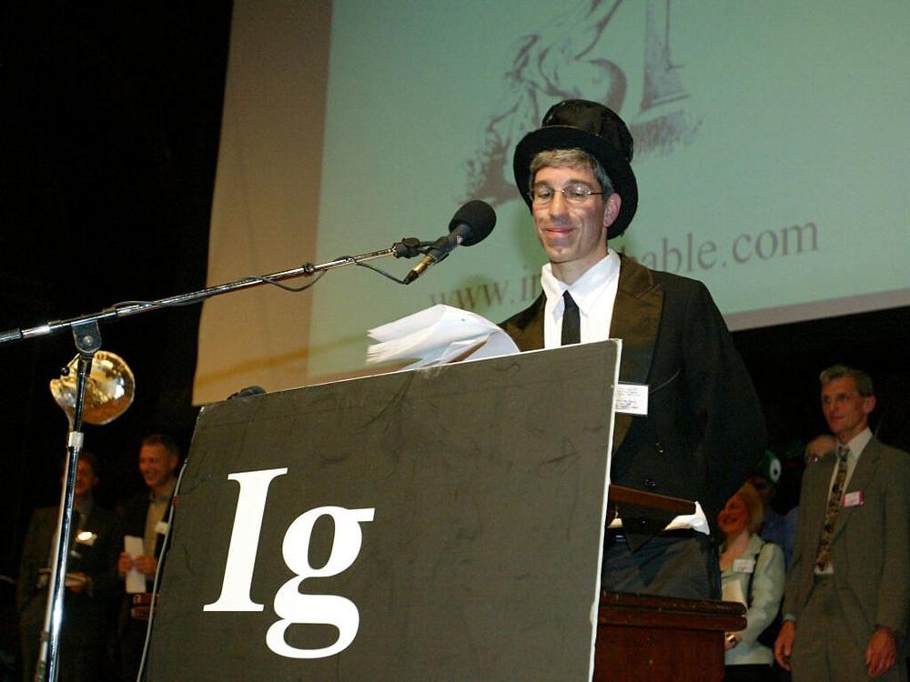Master of Ceremonies Marc Abrahams addresses the audience during a pre-pandemic Ig Nobel Prize ceremony.