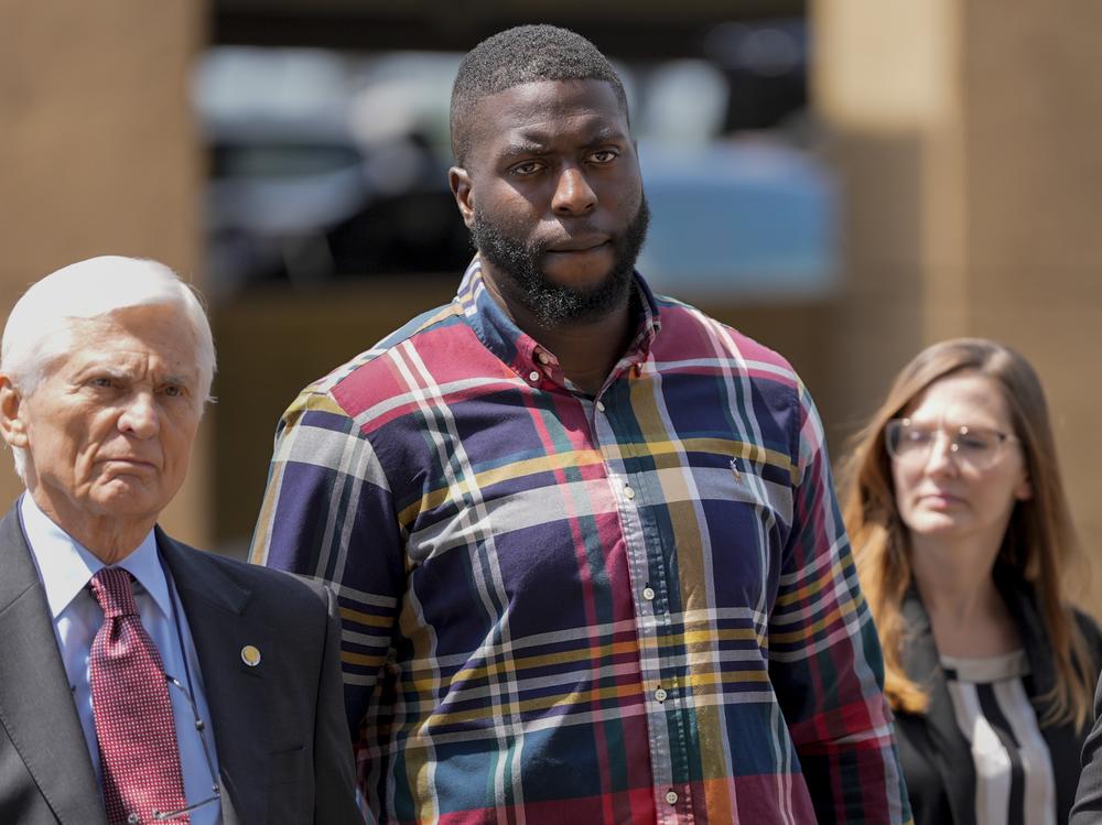 Emmitt Martin III, (second from left) a former Memphis Police Department officer who's accused of killing Tyre Nichols, walks into federal court on Aug. 23, 2024, in Memphis, Tenn.