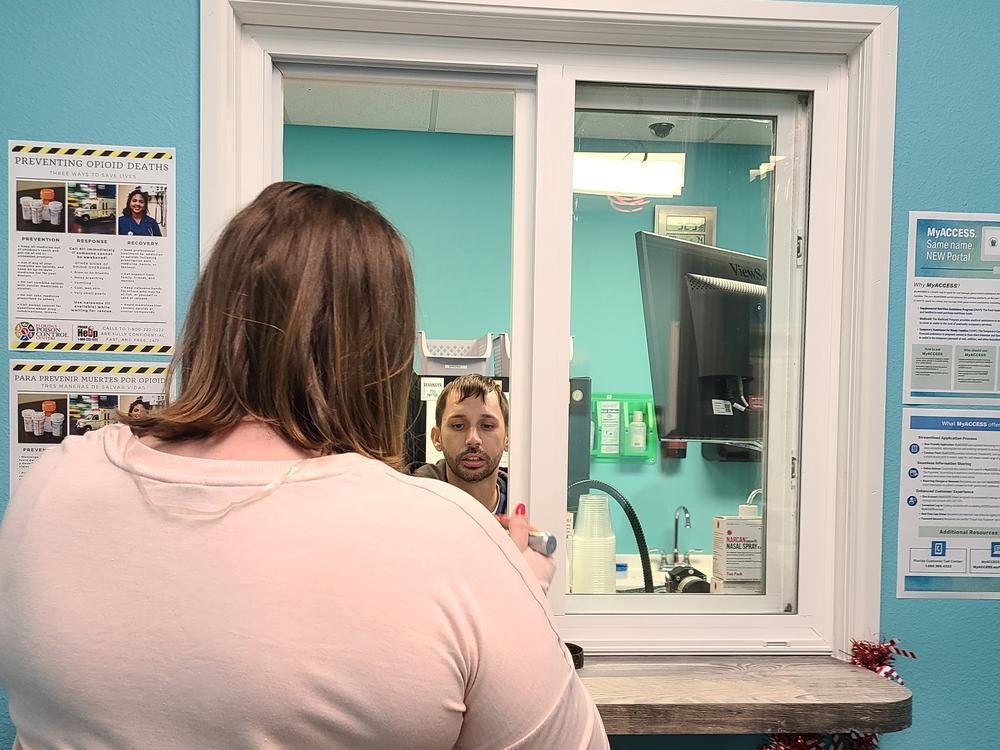 Stephanie, who asked that only her first name be used, picks up her methadone prescription at the Operation PAR clinic in Inverness, Florida. 