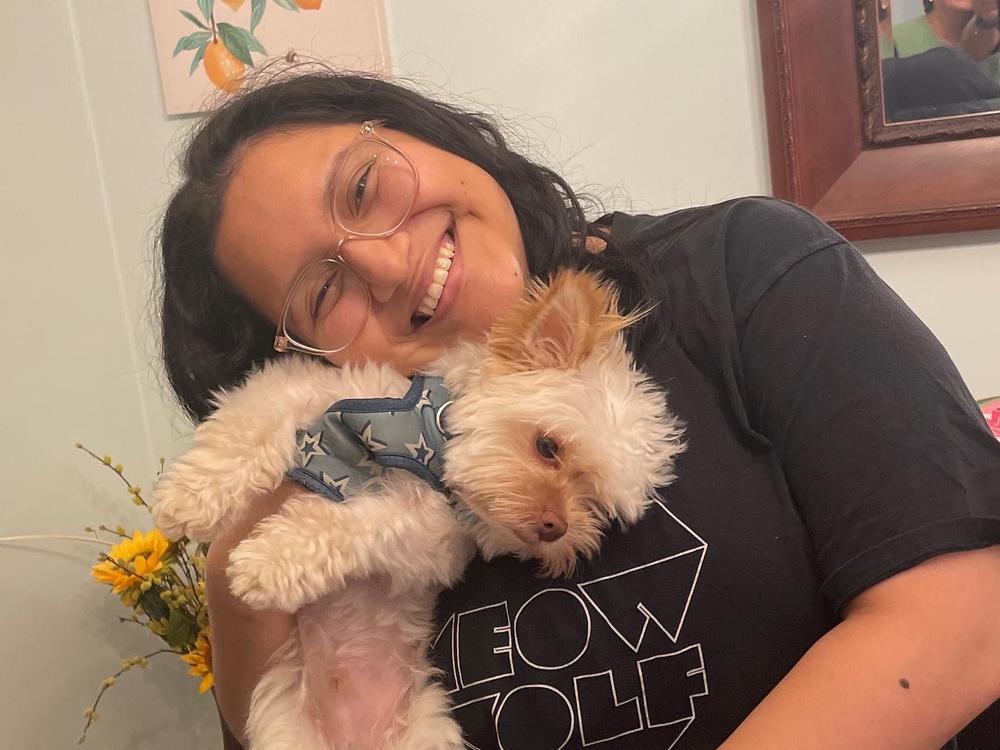 Lourdes Monje with their dog, Tofu