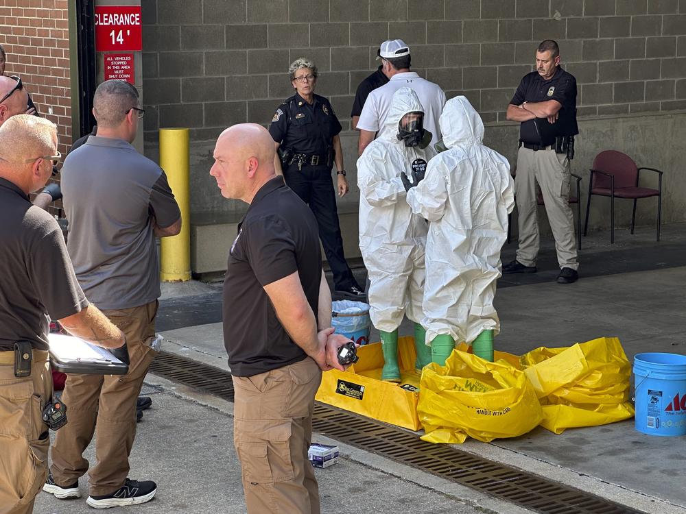A hazmat crew from the National Guard's Civilian Support Team investigates after a suspicious package was delivered to election officials at the Missouri secretary of state's Jefferson City, Mo., office on Tuesday.