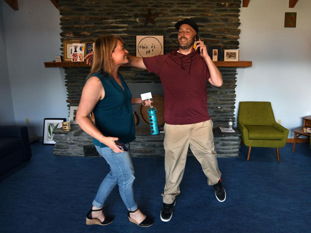 Eric Breeyear, 41 years old, has been in recovery from opioid addiction for roughly a year.  He embraces executive director Julie Bond who runs the Good Samaritan Haven, a shelter that offers addiction programs in Barre and Berlin, Vermont.