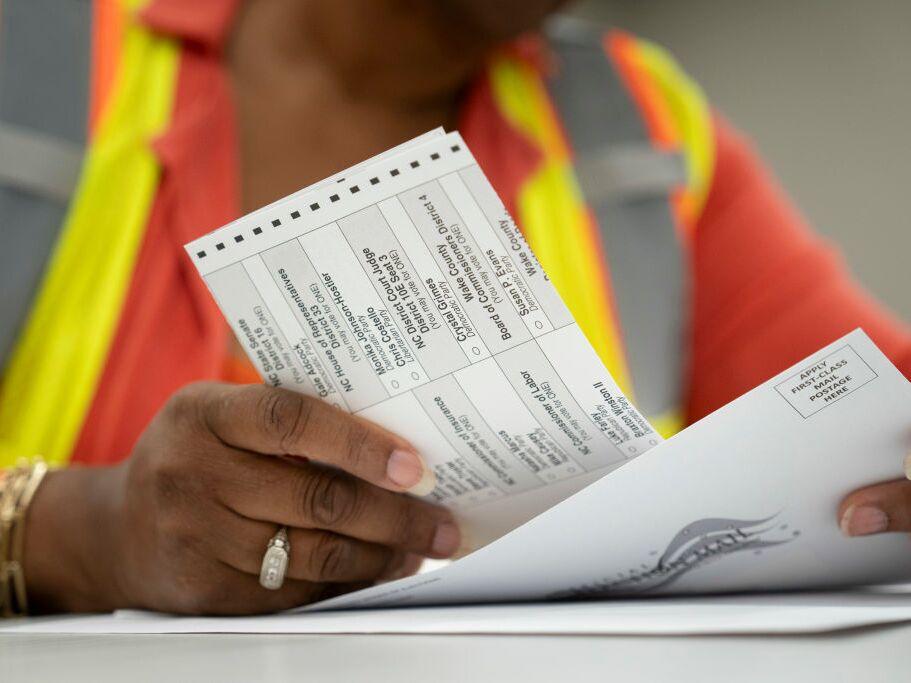 Absentee ballots are prepared to be mailed at the Wake County Board of Elections on Tuesday in Raleigh, N.C.