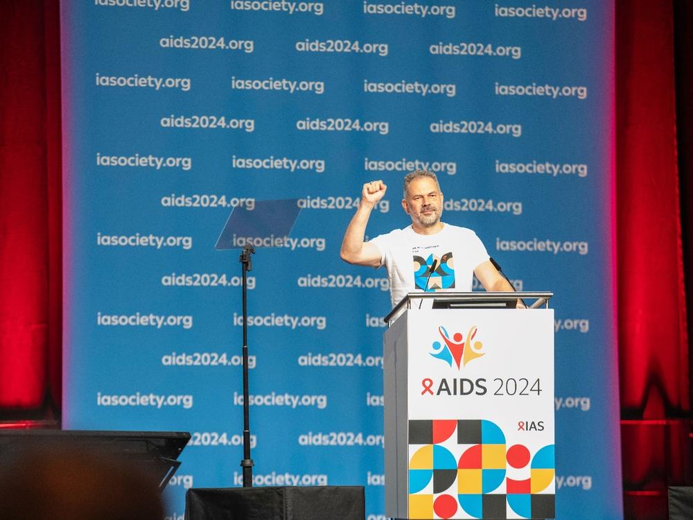 Andriy Klepikov, executive director of Ukraine's Alliance for Public Health, speaks about efforts to diagnose and treat HIV during his talk at the AIDS 2024 conference this summer.