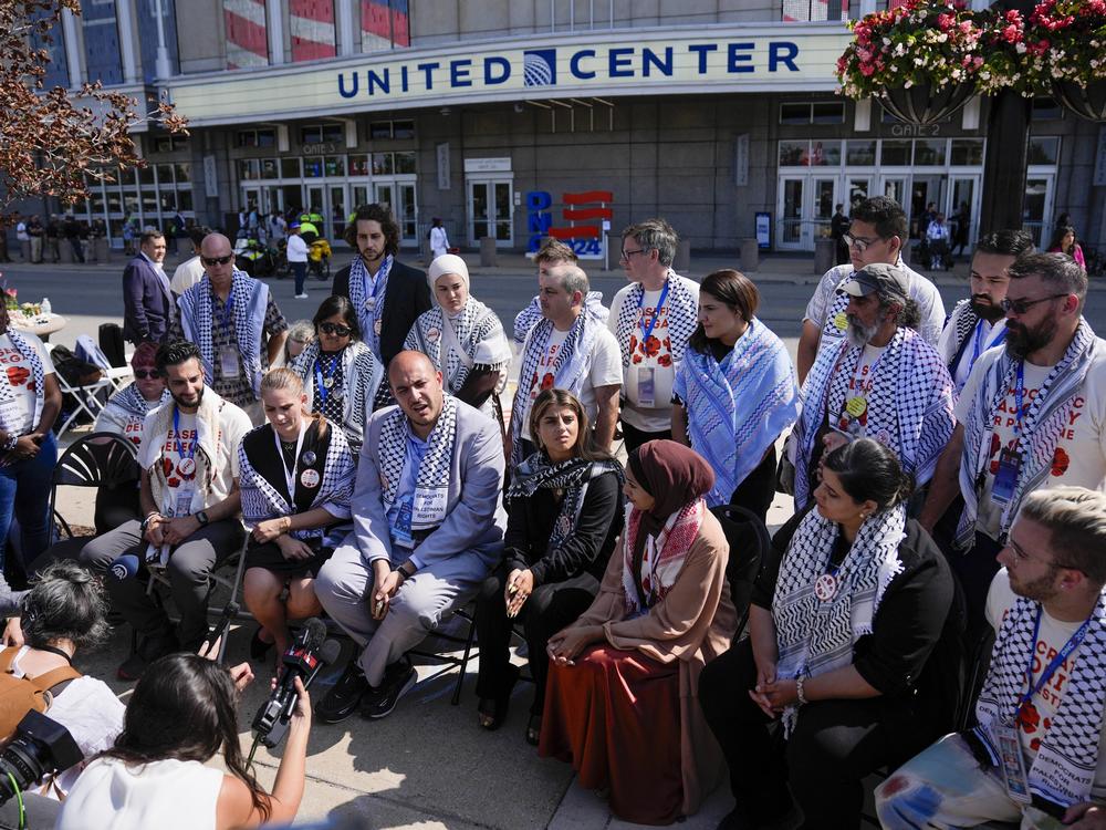 Uncommitted delegates hold a press conference outside the United Center before the Democratic National Convention on Aug. 22 in Chicago. 
