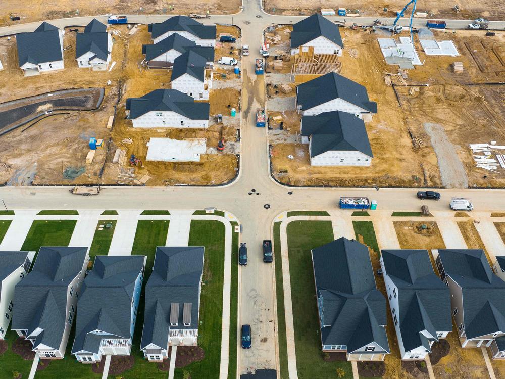 Completed and under-construction new homes are seen in Trappe, Md., in 2022. Lower interest rates and an expected bump in demand from buyers are likely to spur more homebuilding.