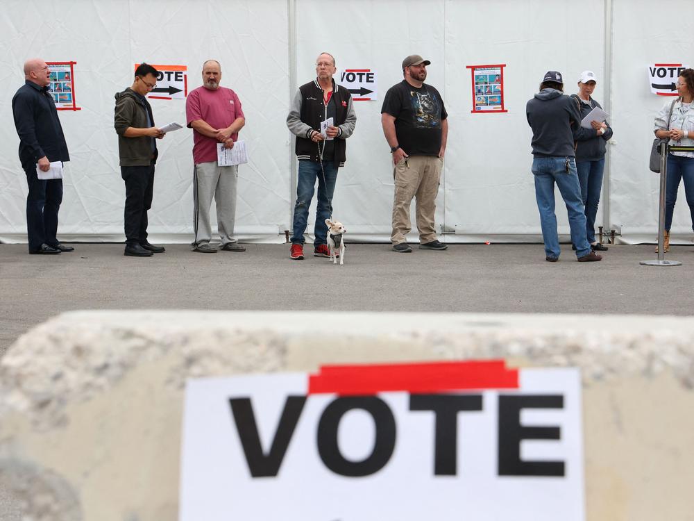 Voters wait in line at a Las Vegas polling place on Nov. 8, 2022. Voters in Nevada — and several other states — may enact big changes to their election systems.