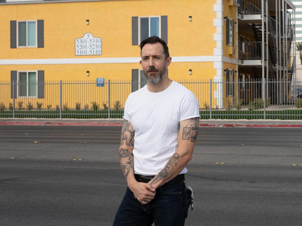 Nicholas Barr, Assistant Professor in the Department of Social Work at the University of Nevada Las Vegas, outside of Siegel Suite flexible-stay apartments in Las Vegas, Nevada, on Sept. 20, 2024.