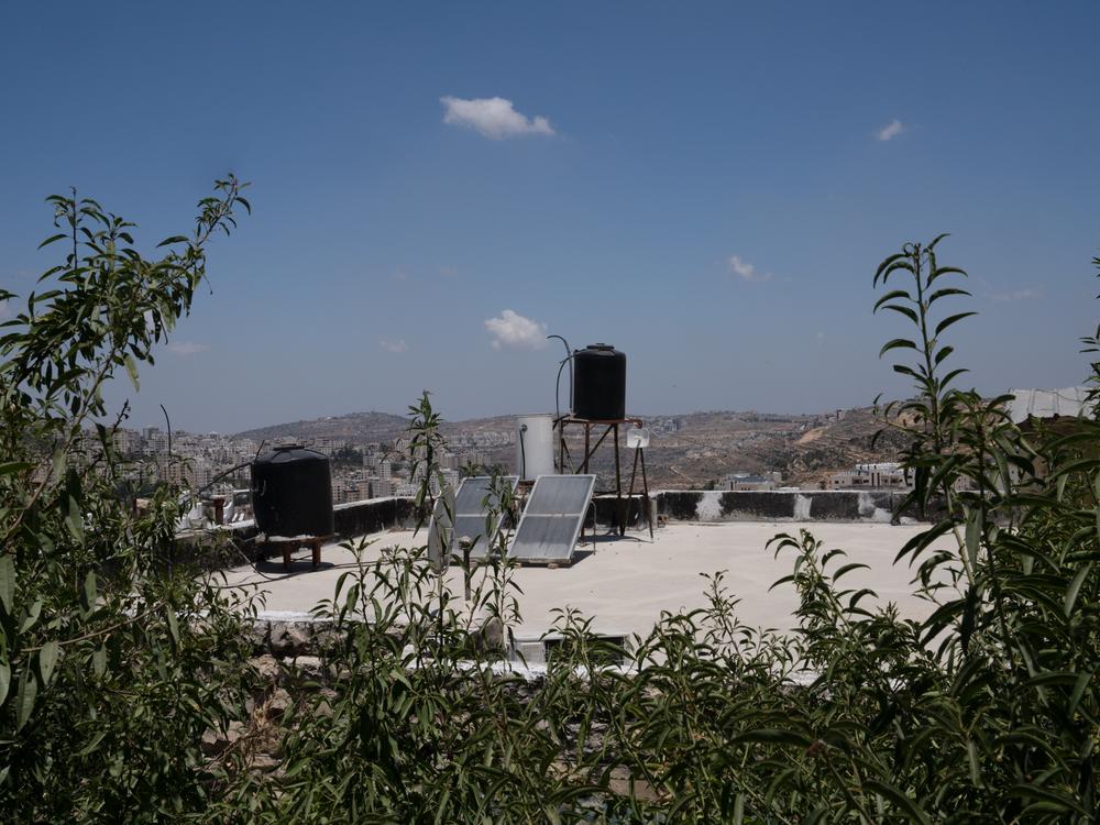 Water tanks are a fixture on the roofs of Ramallah. 