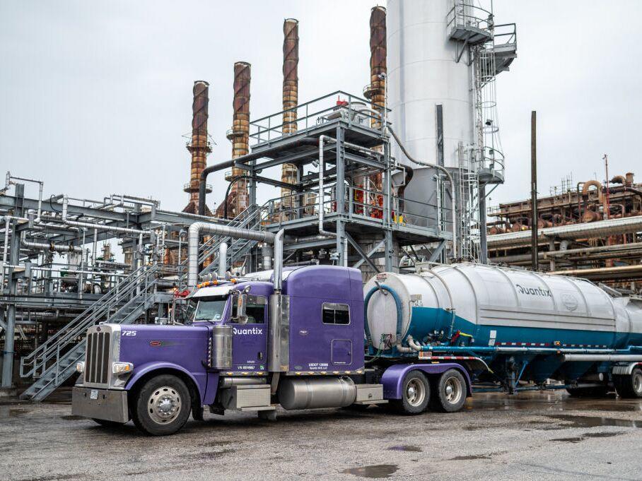 A truck pulls up to ExxonMobil's chemical recycling plant in Baytown, Texas. Plastics are made from fossil fuels. And ExxonMobil is the world’s largest producer of fossil fuel products that eventually get turned into products like plastic bags, forks, or packaging.<br>