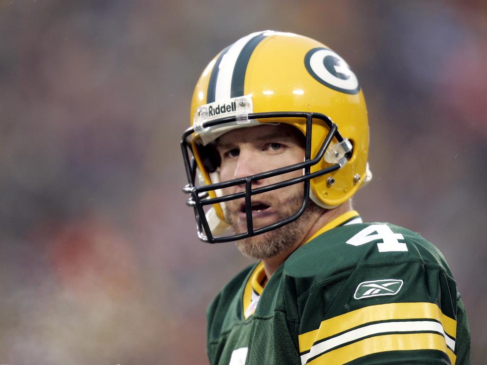 Former NFL all-star quarterback Brett Favre says he has Parkinson's disease. Favre played 20 seasons in the NFL, mostly with the Green Bay Packers. He retired in 2011. Favre won the Super Bowl and was a three-time NFL MVP. He also had his share of concussions and said he had often had memory loss.