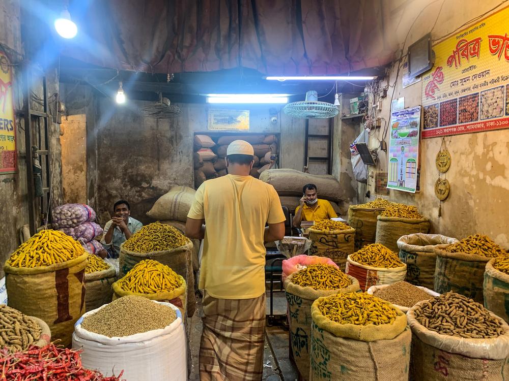 Bright yellow turmeric stands out among other spices that retailers sell at Shyambazar, Bangladesh’s largest wholesale spice market.