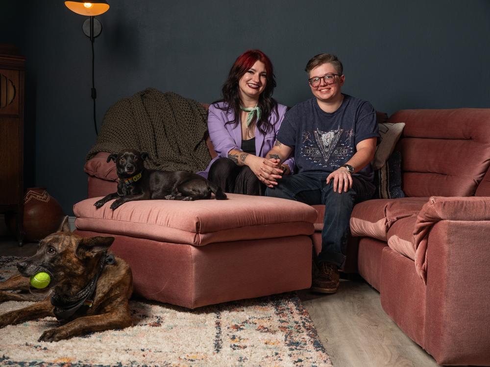 Lauren Tuvell (left) and James Watts with their dogs Xena and Desi in their home in Downtown Las Vegas on Sept. 24, 2024.