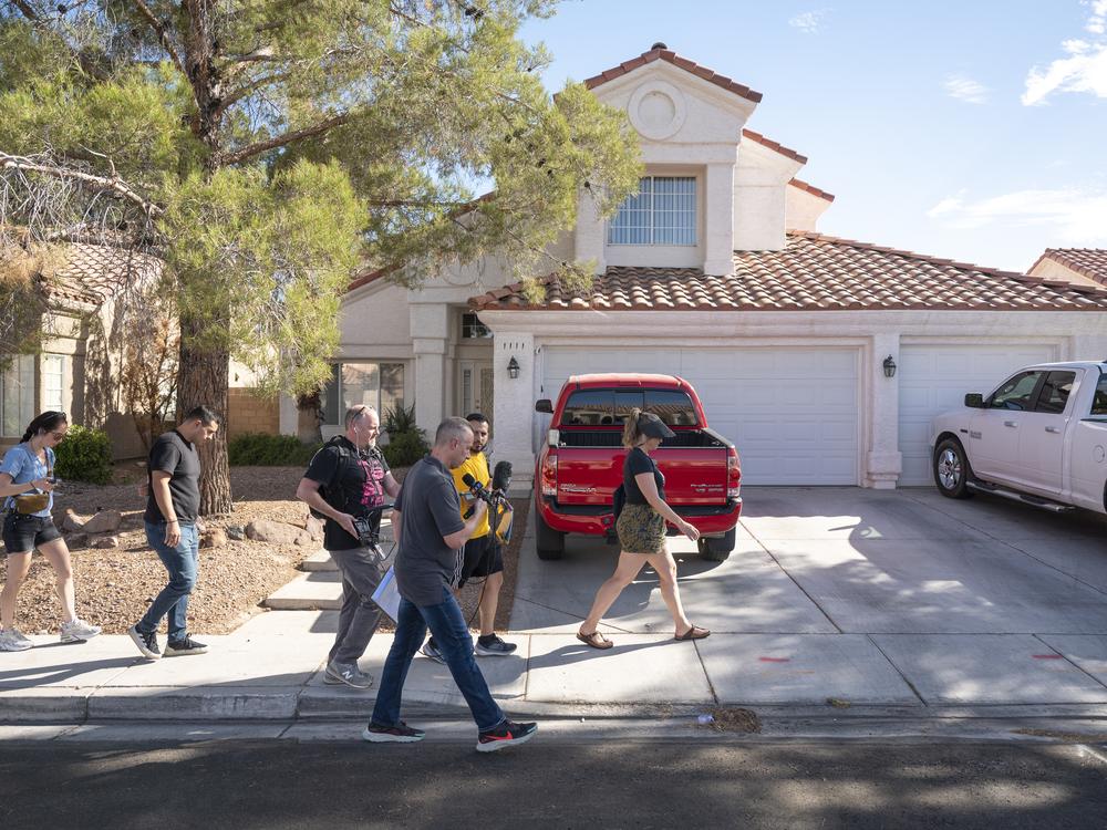 A Martinez walks with canvassers in Nevada. 