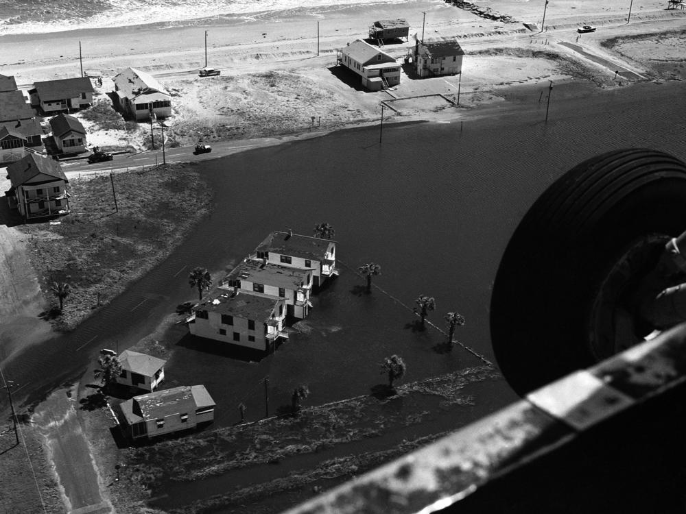 Cottages at Carolina Beach on Sept. 28, 1958, were surrounded by water in the wake of that year's Hurricane Helene. 