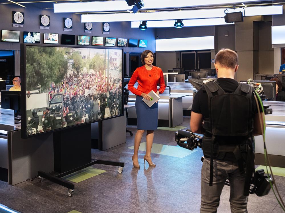 A file photo of RT anchor Aliana Nieves, who was hosting a Spanish-language news program on Dec. 6, 2019 in Moscow. While RT's reach in the U.S. and Europe has been curtailed by sanctions since Russia invaded Ukraine in 2022, the network still has a significant reach in Africa and Latin America. 
