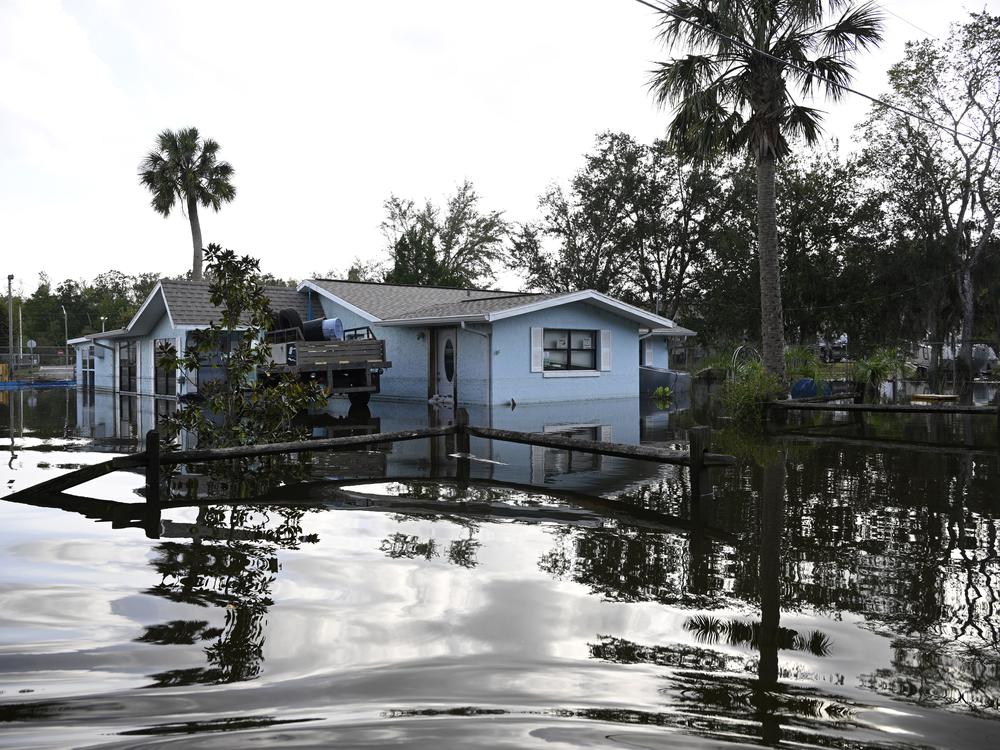 Floodwaters surround a home in the aftermath of Hurricane Helene on Friday in Crystal River, Fla.