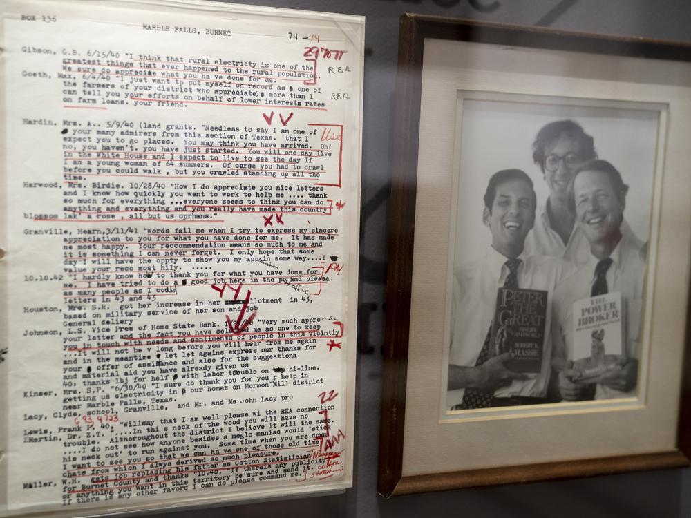 Writing notes and a framed photograph from Robert Caro appears during a tour of a permanent exhibit in his honor, 