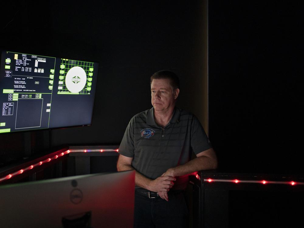 Software engineer Jonathan Zahn monitors the Orion Engineering Simulator screens inside the Beta Dome.